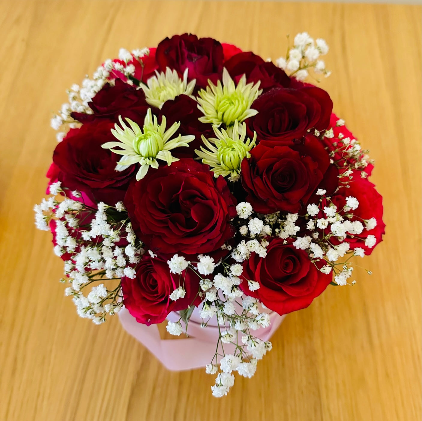 Red roses with rounded box